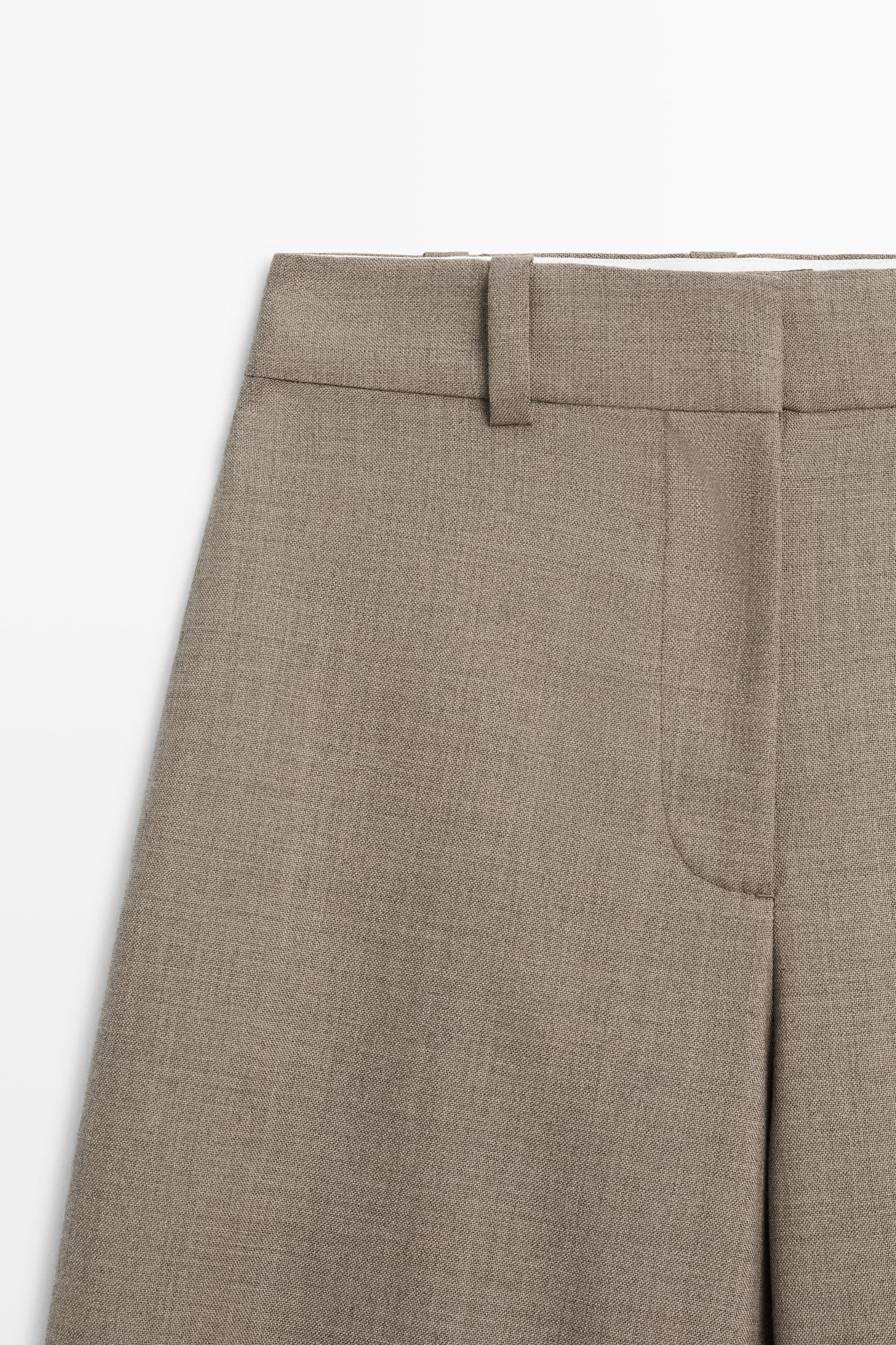 100% wool darted pants with buttoned hem detail